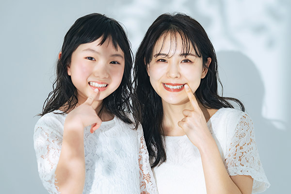 歯並びの綺麗な親子